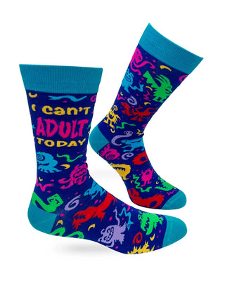 Pair of deep blue men's crew socks with I Can't Adult Today saying, colorful monster print, and teal cuffs, heels, and toes