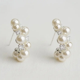 Pearl and crystal cluster hoop earrings - side profile view on soft white background