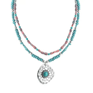 Double-strand Southwestern turquoise and coral-hued statement necklace with silver-tone concho pendant