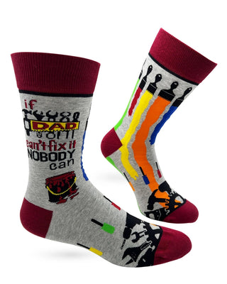 Pair of gray men's crew socks with If Dad Can't Fix It Nobody Can saying, colorful paint and tool graphics, and burgundy accents