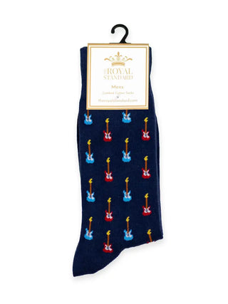 The Royal Standard men's navy socks patterned with red and blue electric guitars, shown in branded packaging