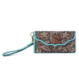 Myra hand-tooled brown leather wristlet wallet with turquoise trim, floral carving, and wrist strap