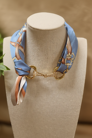 Periwinkle blue equestrian print silk scarf necklace with gold rhinestone snaffle bit pendant
